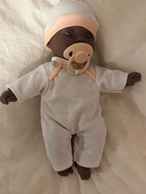 Peach-Trim Baby Doll with Pacifier